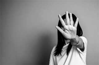 STOP.  stock photo of a woman holding her hand up saying stop