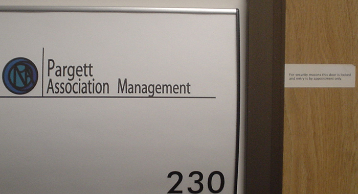 Pargett Association Management keeps its door locked during normal business hours, avoiding all customers who stop by on legitimate business