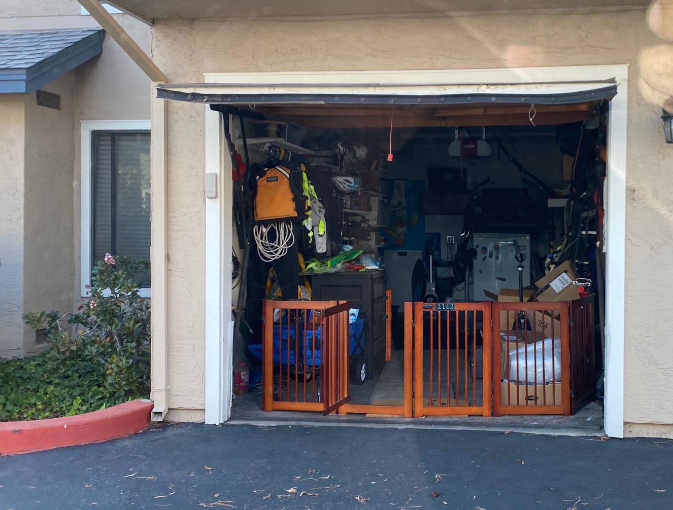 Edgewater Isle garage being used for storage instead of parking a car.  This is against the association's rules.